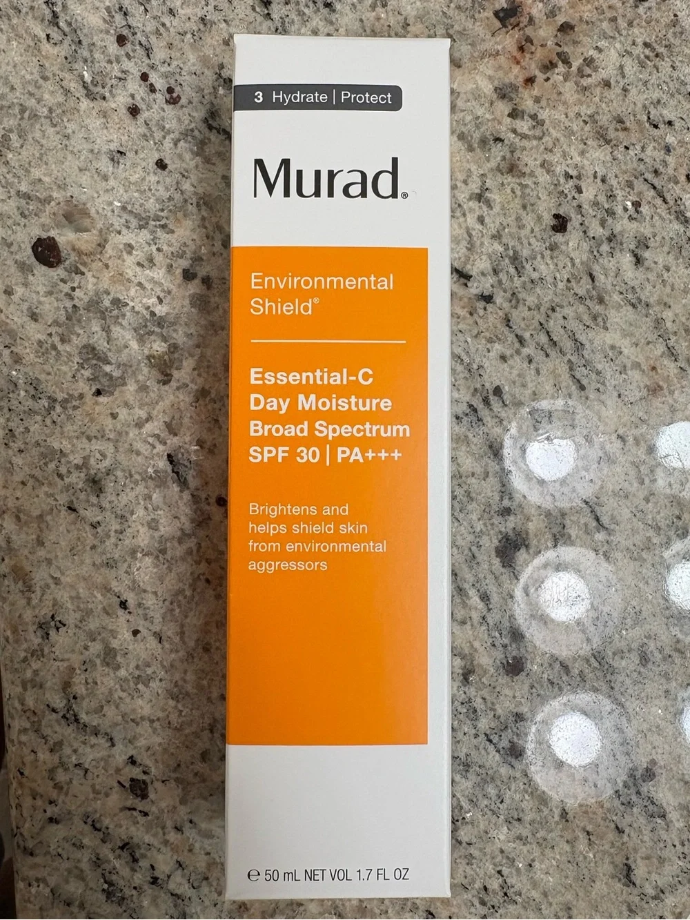 Murad Essential-C Day Moisture SPF 30 in Bright Orange Packaging